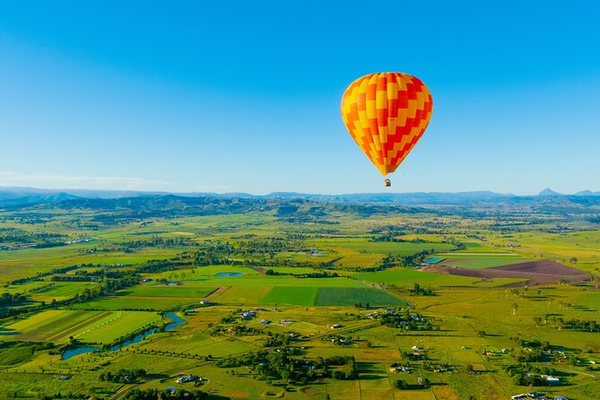 Gold Coast Hot Air Balloon + Winery Breakfast + Return Transfers - Landing, mud, and the balloon pack-up