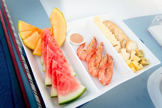 Gold Coast Sunset Cruise with sparkling wine & nibbles platter - Sea World, Wave Break Island, and the Seaway