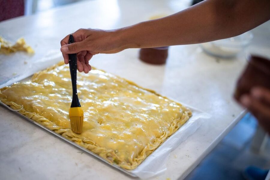 Greek Cooking Class with a Local Chef, Wine, & Meal in Drios - The opening aperitif: wine, souma, and food stories