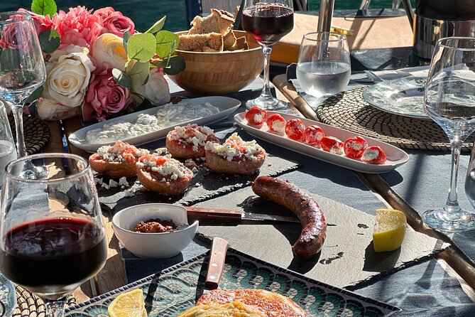 Greek Gastronomy & Wine Pairing Cruise with a Sommelier in Athens - Ydrousa and the swimming stop