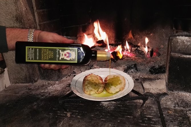 Greve in Chianti Wine Tasting and Winery Tour - Walking the vineyard and olive groves