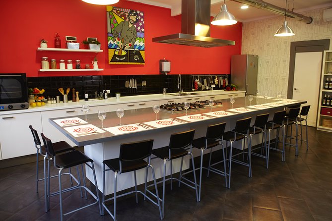 Interactive Paella & Market: Bottomless Wine & Rambla Views - The instructors shape the experience