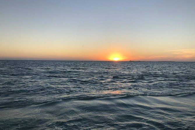 Key West Small-Group Sunset Sail with Wine and Hors d'oeuvres - The sunset view depends on your side of the boat