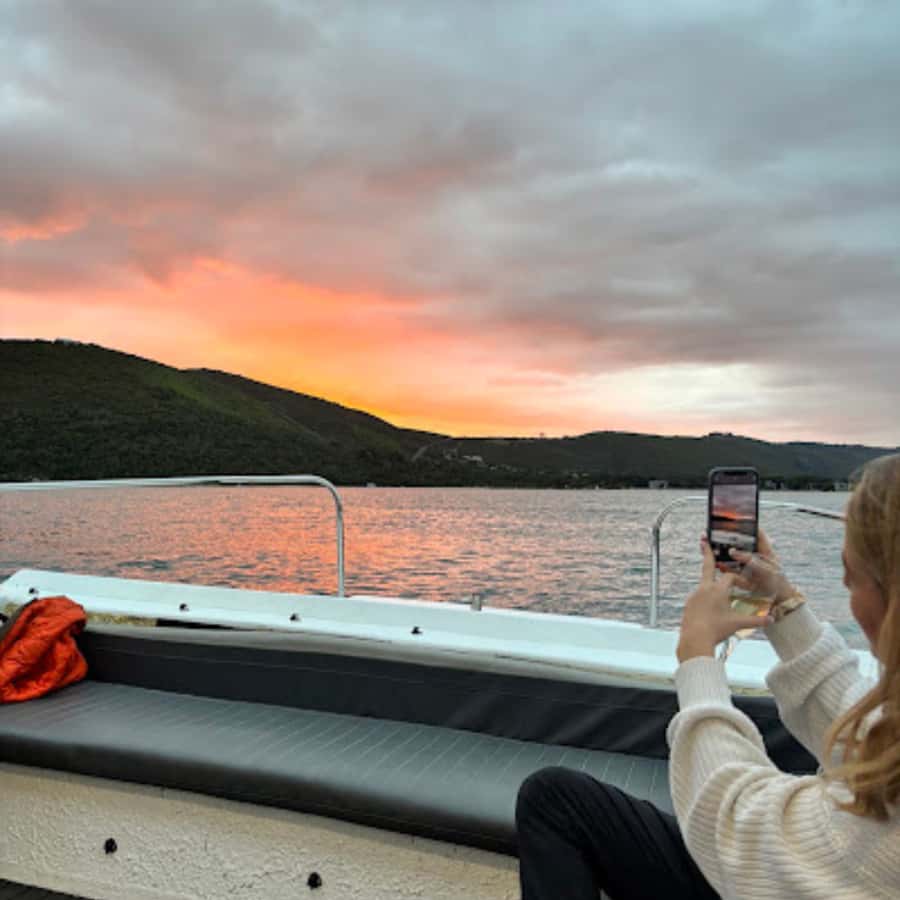Knysna: Wine & Oyster Luxury Lounger Sunset Cruise - Heading toward the Knysna Heads