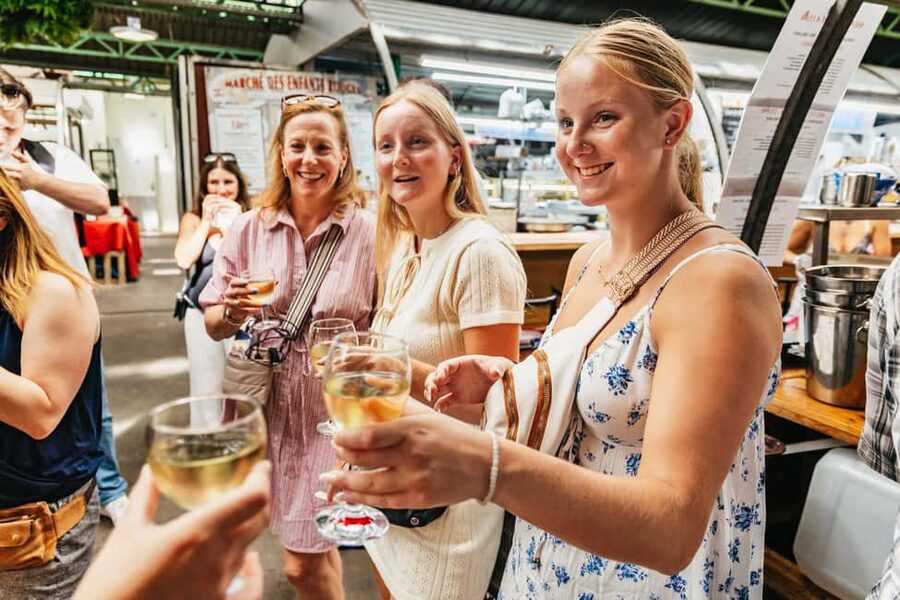 Le Marais Walking Food Tour with Cheese, Wine & Pastries - Marché des Enfants Rouges and the local food scene