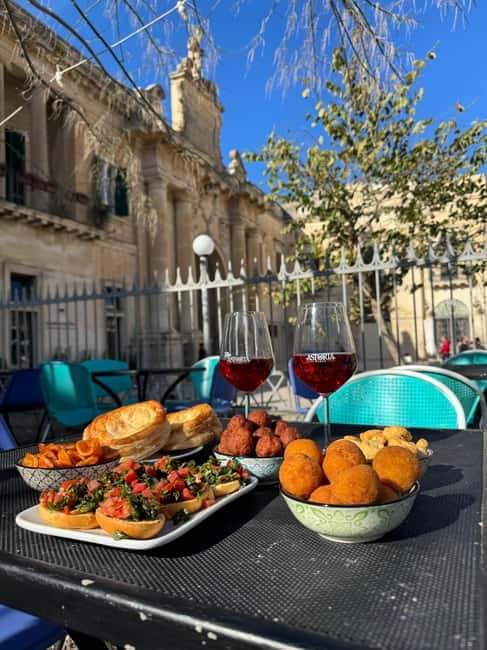 Lecce: Guided Street Food Walking Tour with Food and Wine - Porta Rudiae and the first taste of Lecce