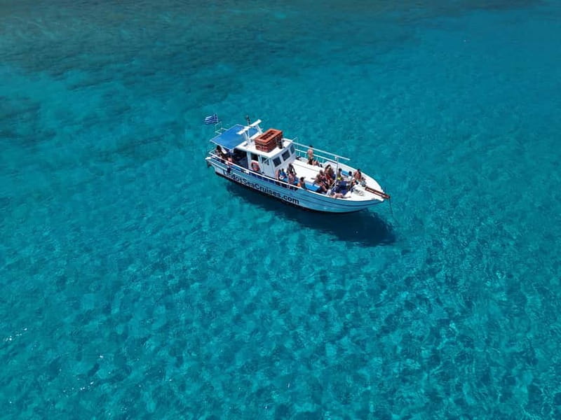 Lindos: Sunset Cruise with Unlimited Aperol, Beers & Wine - Sailing toward Lindos and St Paul’s Bay