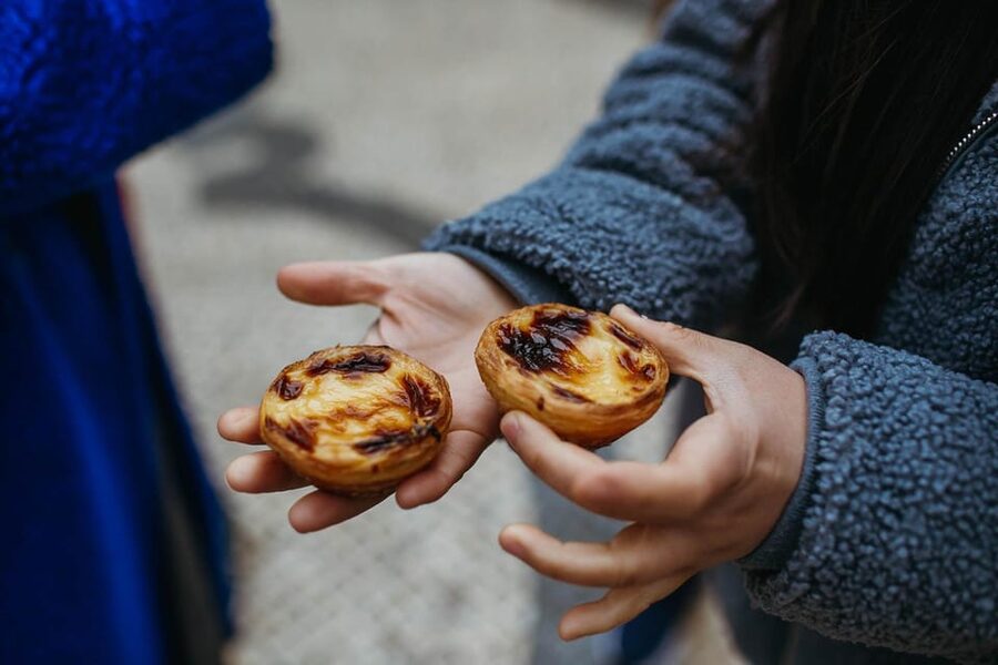 Lisbon: Evening Food & Wine Tour in Bairro Alto - Into Bairro Alto, where the evening begins