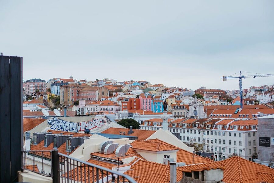Lisbon: Evening Food & Wine Tour in Bairro Alto - Flame-roasted chouriço at Grapes & Bites