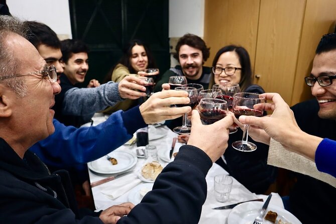 Lisbon Food Tour with 10+ Tastings of Local Delicacies & Wines - Baixa, the Santa Justa Lift, and the city’s changing levels