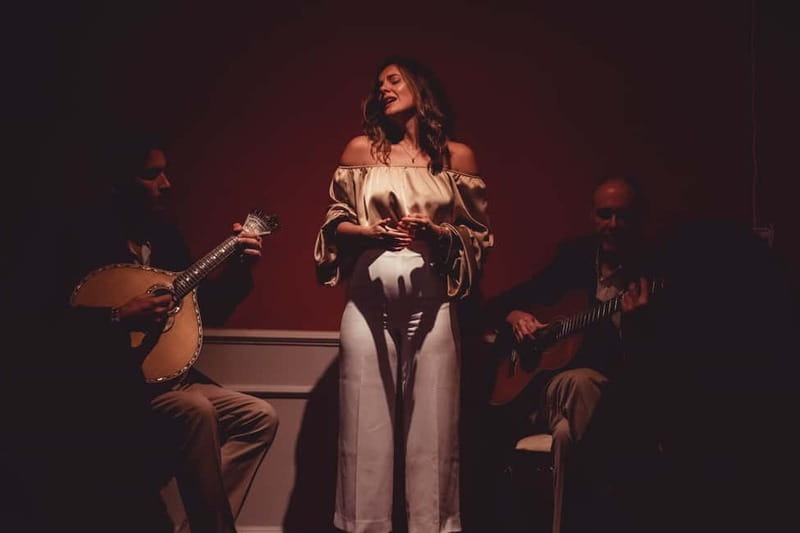 Lisbon: Live Fado Show with Port Wine at Lisboa em Fado - Audience participation near the end
