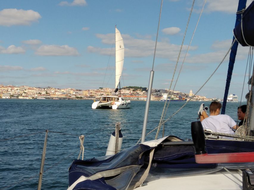 Lisbon: Sailing Tour with Wine and Snacks - Alfama, the Discoveries monument, and the return