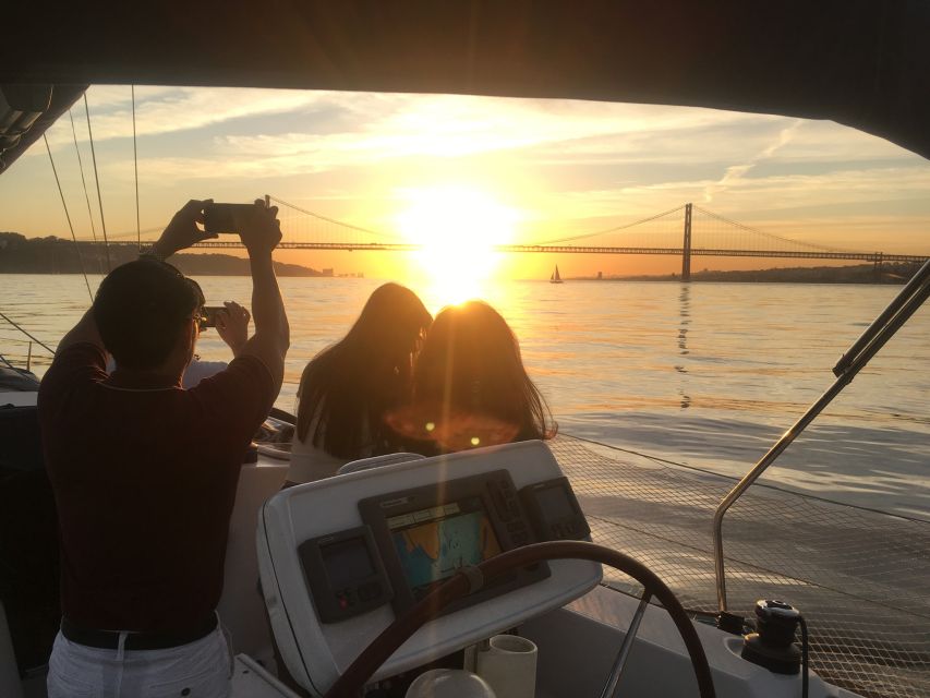 Lisbon: Sunset Sailing Boat Cruise with Wine - Bairro Alto, Commerce Square, and Baixa from the water