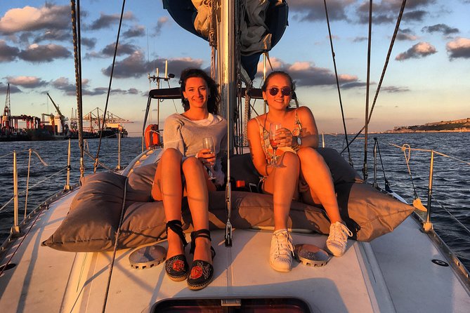 Lisbon Sunset Sailing Tour with White or Rosé Wine and Snacks - Royal residences and art across the river
