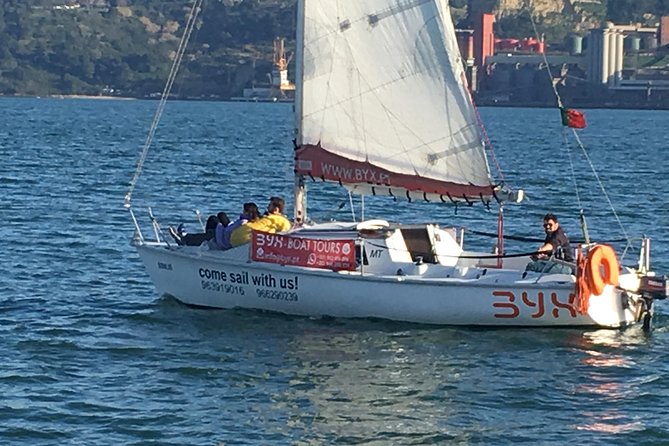 Lisbon Sunset Sailing Tour with White or Rosé Wine and Snacks - Wine, cheese, and the social side of the sail