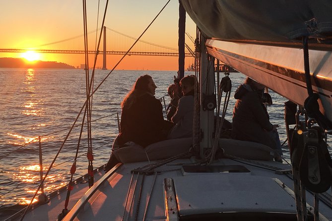 Lisbon Sunset Sailing Tour with White or Rosé Wine and Snacks - Under the 25 de Abril Bridge