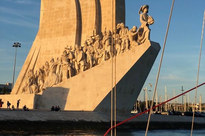 Lisbon Sunset Sailing with Portuguese Wine and History - Alfama, Sé Cathedral, and the castle hills