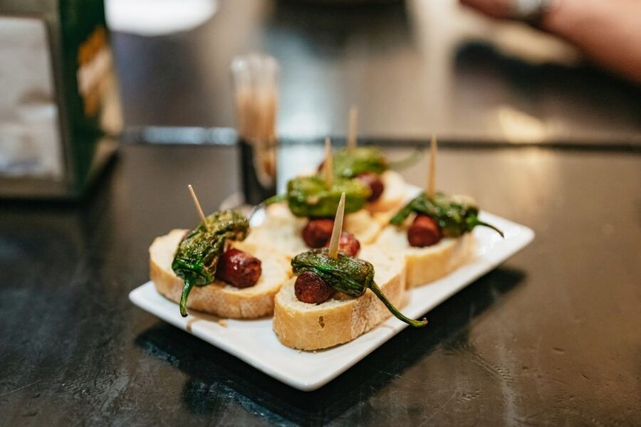 Madrid: Food & Wine Tour with 10 Tapas & 4 Drinks Included - A local-feeling route near Alonso Cano