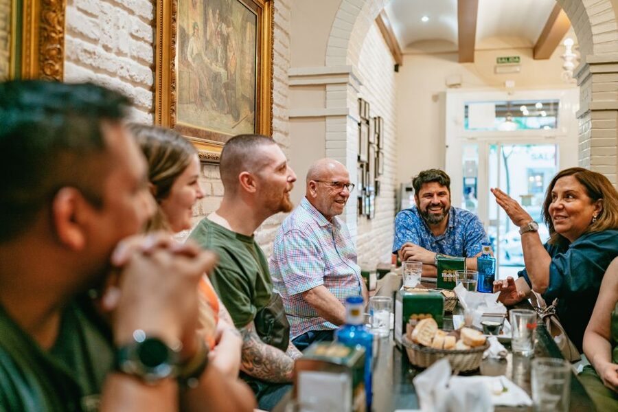 Madrid: Food & Wine Tour with 10 Tapas & 4 Drinks Included - Stop three: slow food and freshly prepared tapas