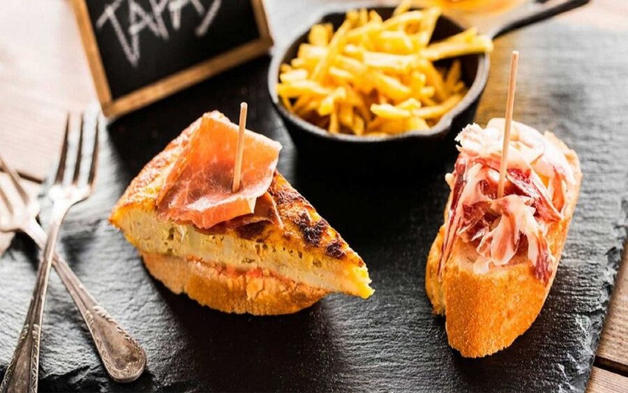 Madrid: Old Madrid Walking Food and Wine Tour - The first tapas stops: more than one bite