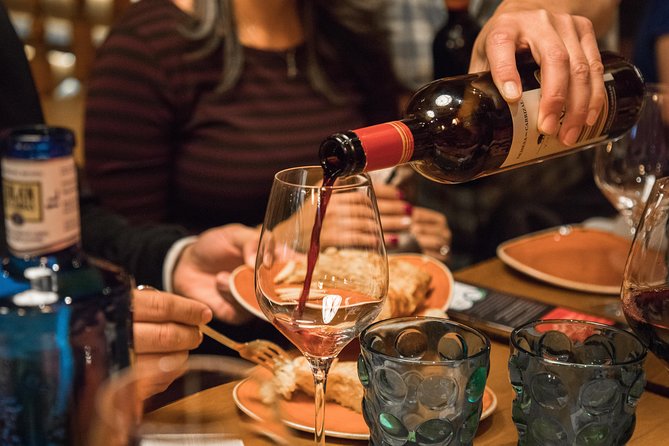 Madrid Tapas & Wine Tasting Walking Tour – Small Group Local Bars - Calle de la Cruz brings an open kitchen