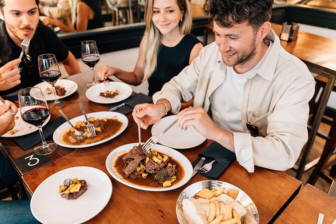 Madrid Tapas & Wine Tour with Rooftop Views and Local Guide - The rooftop finish near Gran Vía