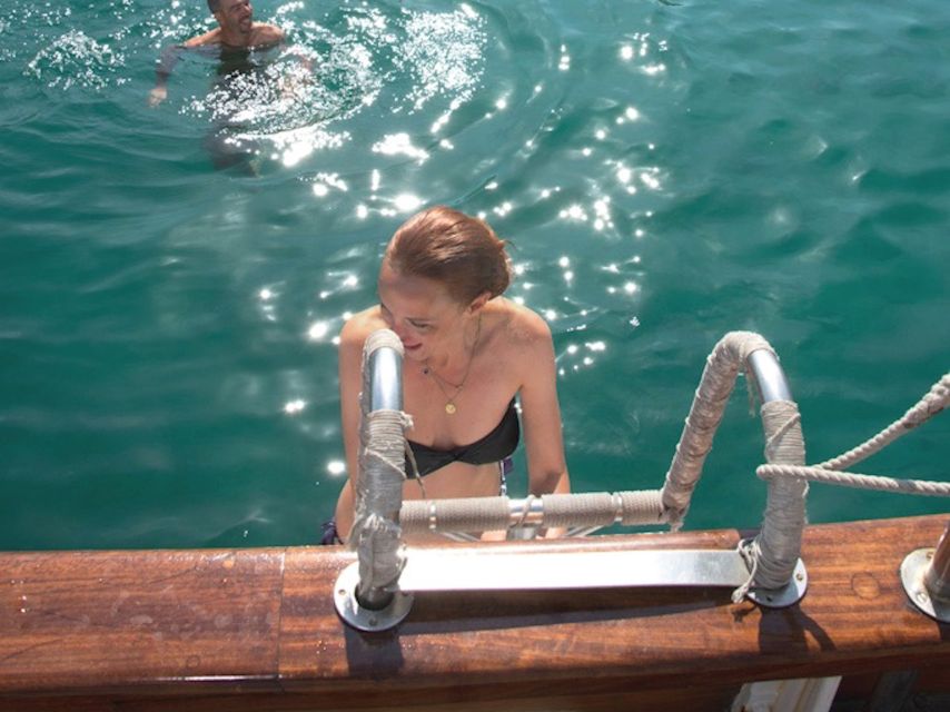 Marseille: Calanques Sailing Day Trip with Lunch and Wine - Swimming and snorkeling in the coves