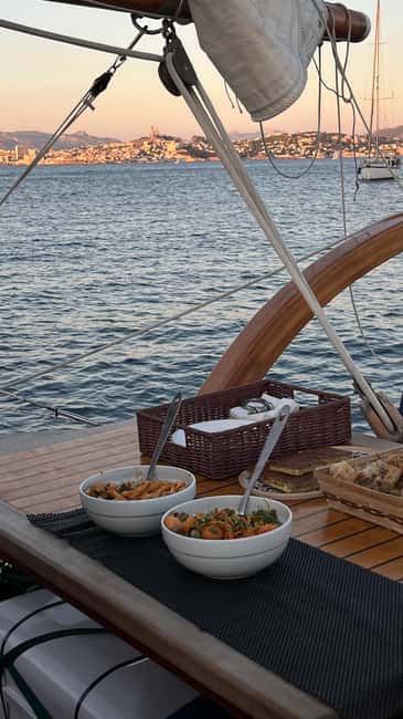 Marseille: Evening sailboat trip to the Calanques du Frioul with buffet and organic wine - Frioul’s Wild Cove and the Swim Stop