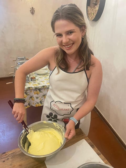 Milan: Pasta and Tiramisu Cooking Class with Wine - Sitting down to eat the food you made