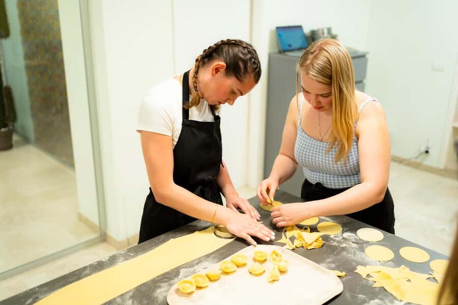 Milan: Pasta, Gnocchi and Tiramisù Cooking Class with Wine - Making ravioli and fresh pasta by hand