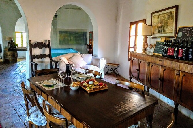 Montalcino: Brunello Wine Tasting & Lunch in a Tuscan Castle - Walking through a castle with a working vineyard
