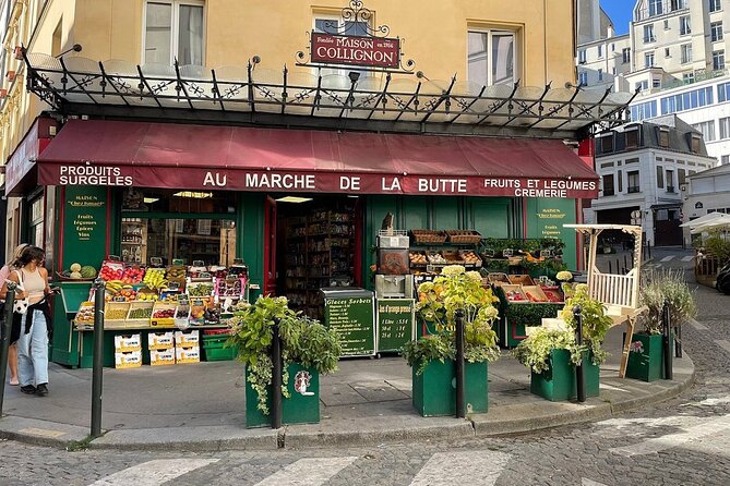 Montmartre Hill French Gourmet Food and Wine Tasting Walking Tour - Starting across from the Moulin Rouge
