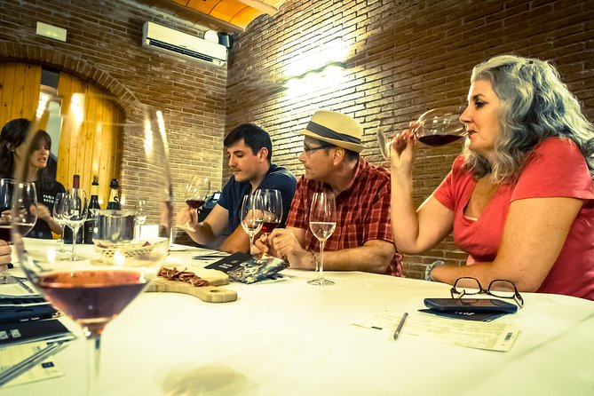Montserrat & Winery Visit Tour with Traditional Farmhouse Lunch - A family winery and four Catalan tastings