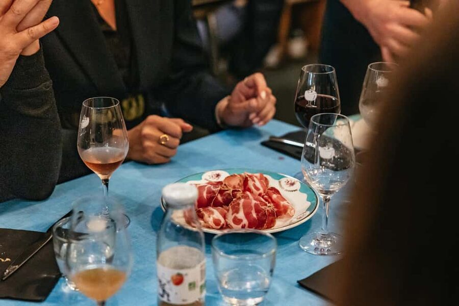 Nice: Sunset Food Tour with Full Meal and Wine - The restaurant stop turns tasting into dinner