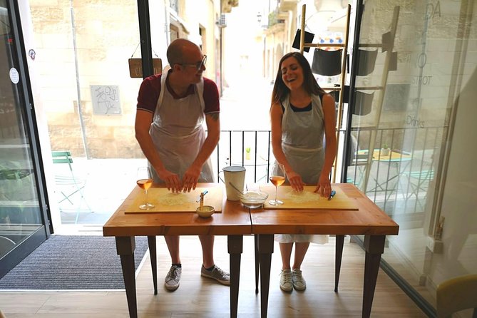 Orecchiette Cooking Class and Wine Pairing in Lecce - A wine class with a plate of Puglia