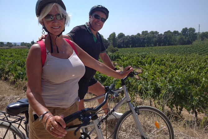 Paella Class, Winery & Bike Ride - Free Hotel Pickup from Sitges - Cycling through the Penedès vineyards