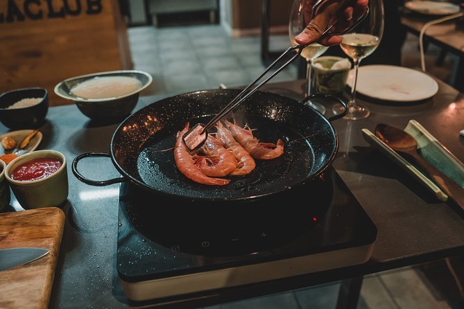Paella Experience and Bottomless Wine in Barcelona - Unlimited wine changes the mood