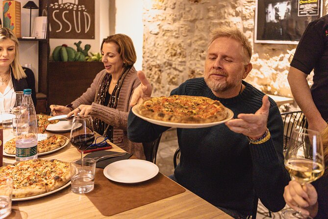 Palermo Evening Food & Wine Tour with Eating Europe - Sicilian pizza inside Assud a Santamarina