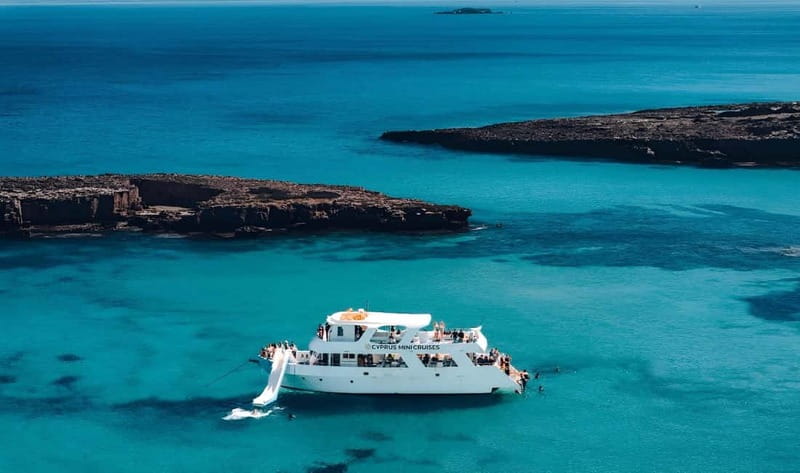 Paphos: Blue Lagoon Afternoon Cruise with Swim, BBQ & Wine - From Paphos to Latchi, the evening gets underway