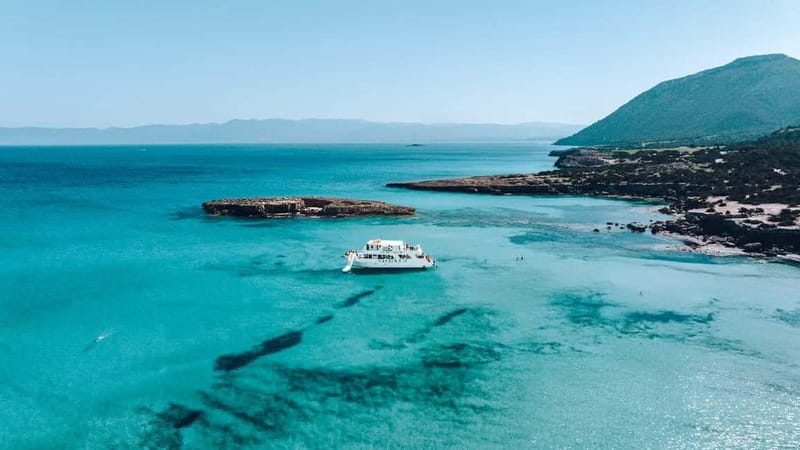 Paphos: Blue Lagoon Afternoon Cruise with Swim, BBQ & Wine - Pickup details that can affect your day