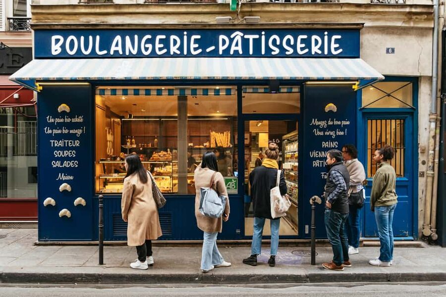 Paris: Gourmet Food Tour with Over 10 Tastings and Wine - Starting with croissants and jambon beurre
