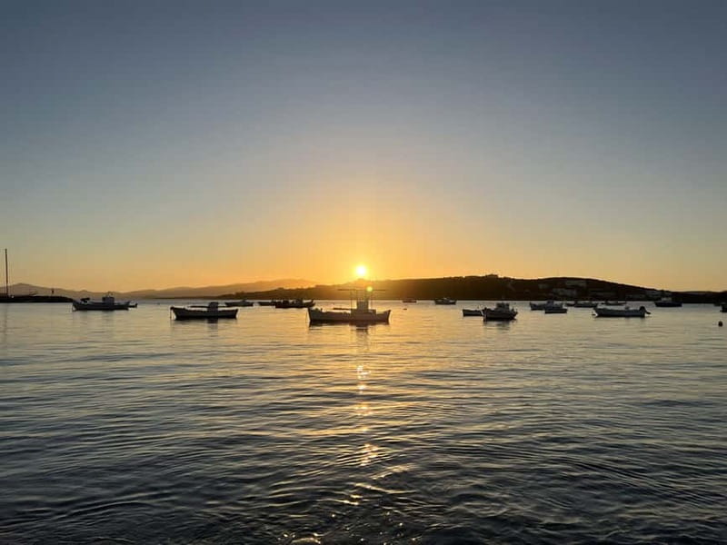 Paros: Sunset Boat Trip with Soft Drinks and Local Wine - The Fira channel and the evening pause