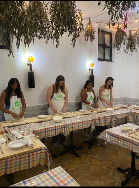 Pasta and tiramisù Cooking class with Wine at Piazza Navona - Sitting down to eat your own work