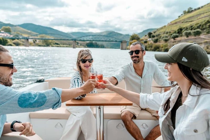 Pinhão: Douro River Solar Boat Tour with Wine Tasting - Thirty minutes toward Romaneira
