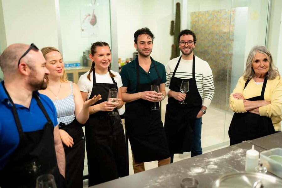 Pizza and Tiramisu Cooking Class with Wine in Milan - The chefs and teaching style