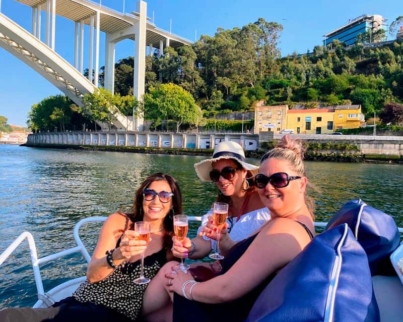 Porto: Douro Cruise, 6 Bridges & 4 Port Wines (Max 7) - Under Arrábida Bridge toward Porto’s old waterfront