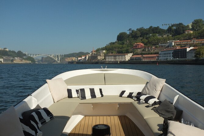 Porto: Douro River Boat Cruise with Port Wine and Snacks - The glass gazebo and gardens above the river