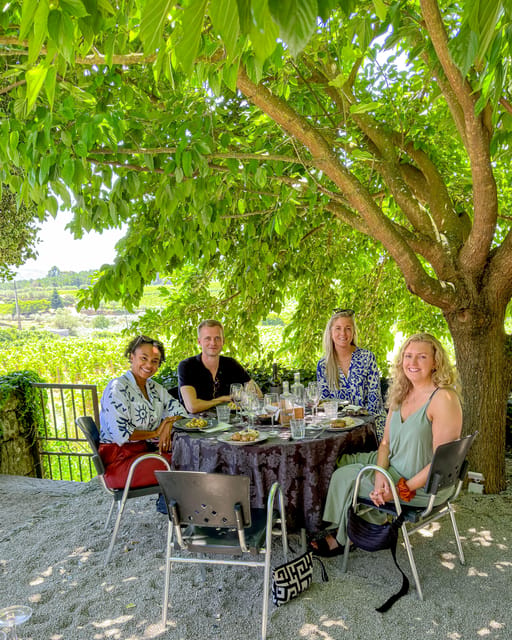 Porto: Douro Valley Tour with 2 Wineries, Lunch and Cruise - Meeting at Trindade and settling into the van