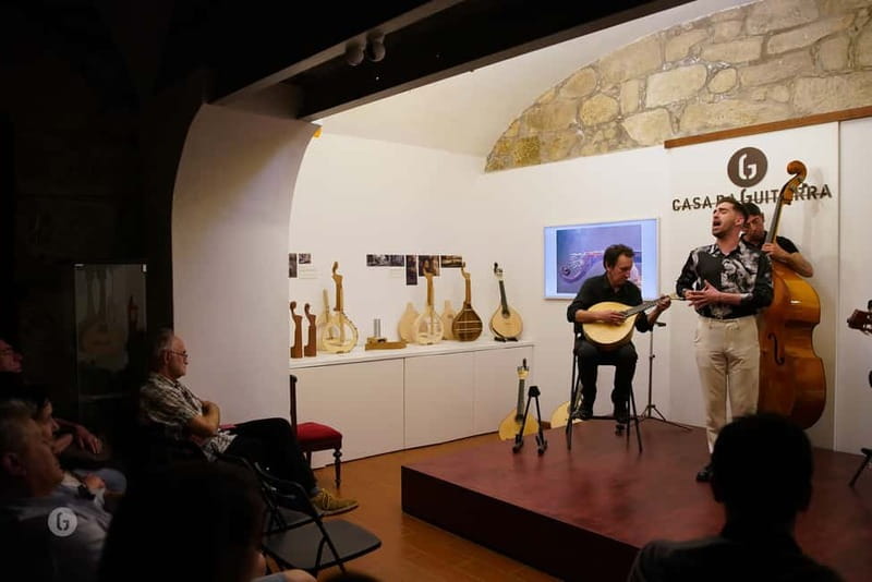 Porto: Fado & Port Wine in Traditional Portuguese Music Shop - The instruments come before the singing