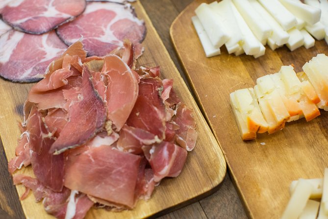 Porto Food & Wine Tasting Tour with Lunch or Dinner Option - Codfish cake and liquor at Leandro Café